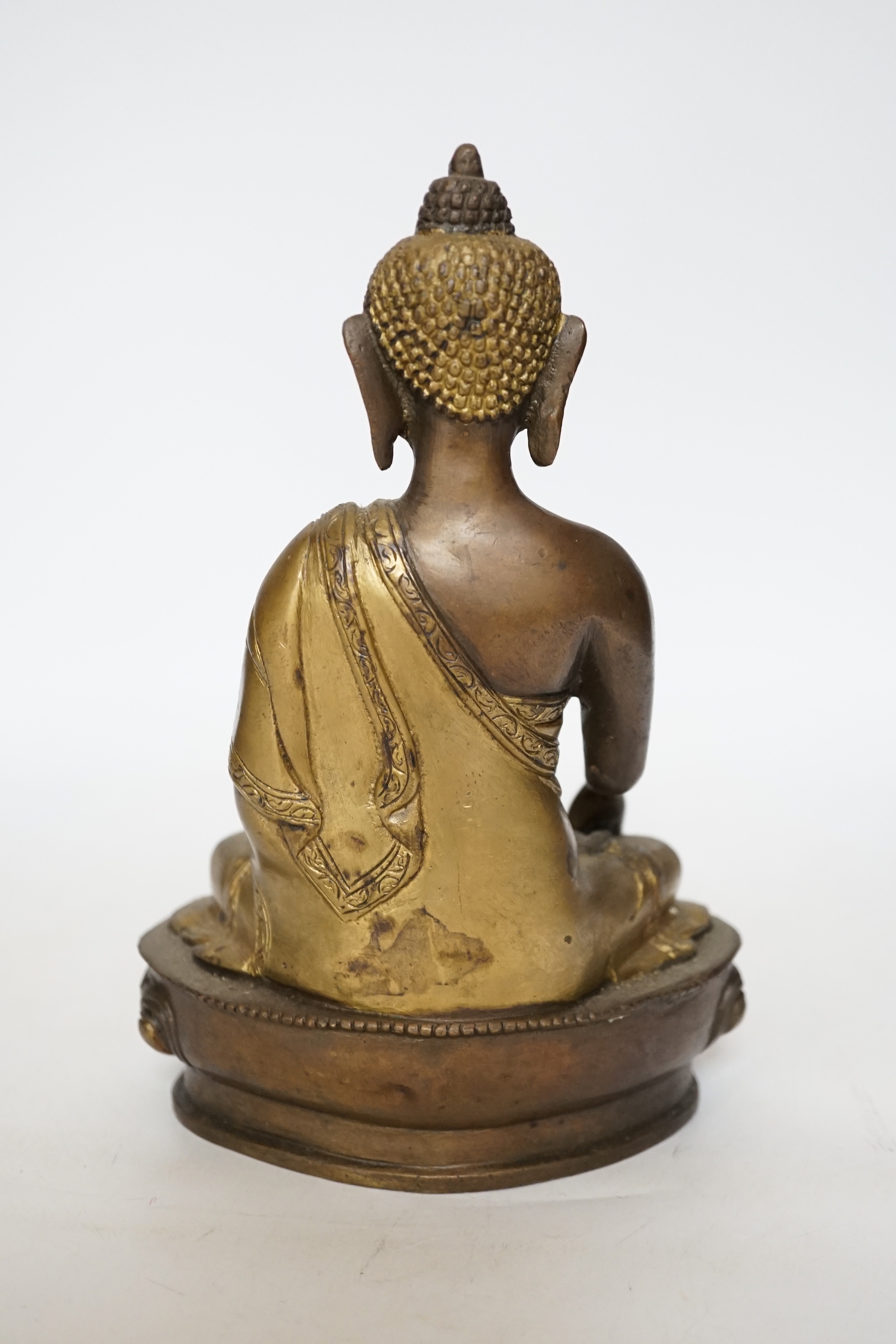 A South East Asian bronze Buddha, 22cm